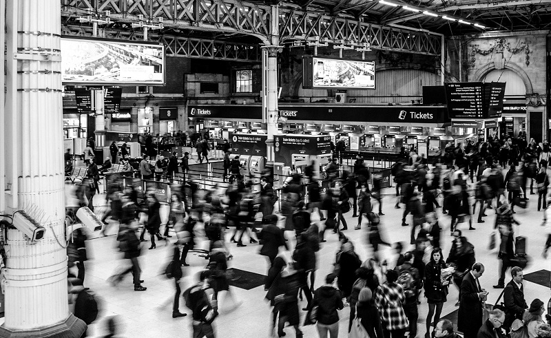 Applying Lean At Massive Scale People Walking Through a Station